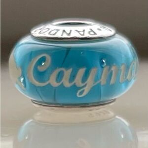 Authentic Pandora Cayman Island Exclusive brilliant blue Murano glass charm.